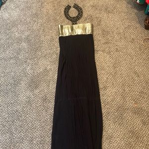 Black and gold unique maxi dress with neck halter detail. SIZE S.